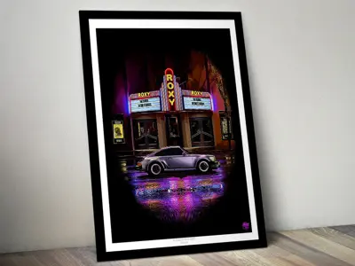 Póster del Porsche 911 «50 años de la Serie G» con marco negro.
