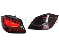 Frecce posteriori a LED fumè scuro / lente rossa e base a cuneo centrale nera Porsche 987 MKII / 987C MKII - 98763142703, 98763142803